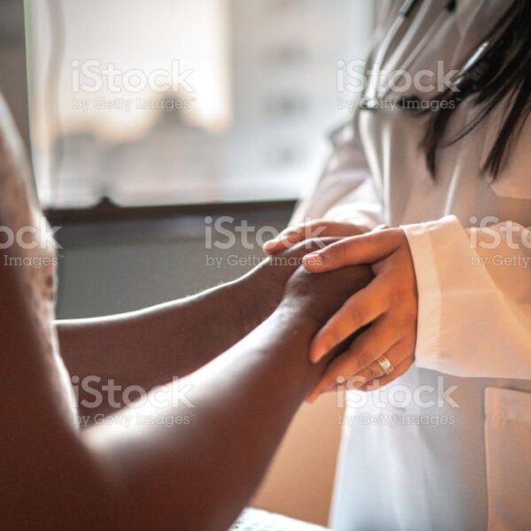 Doctor and patient at hospital room with face mask